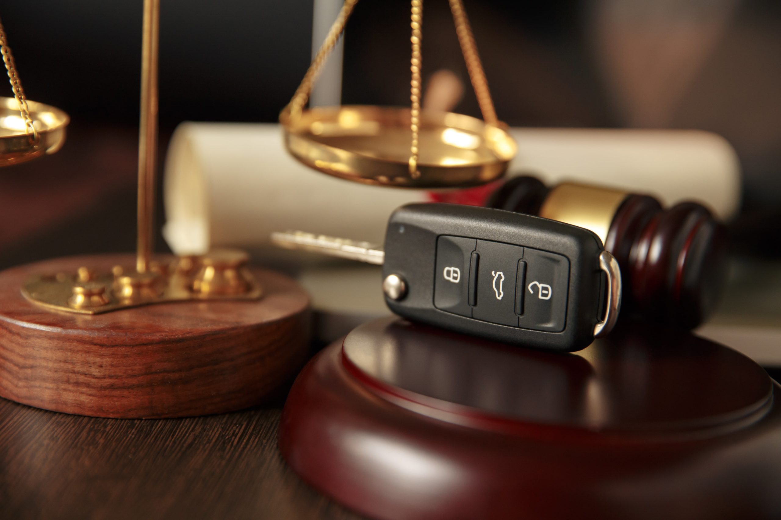 Car keys, a gavel, and the scales of justice